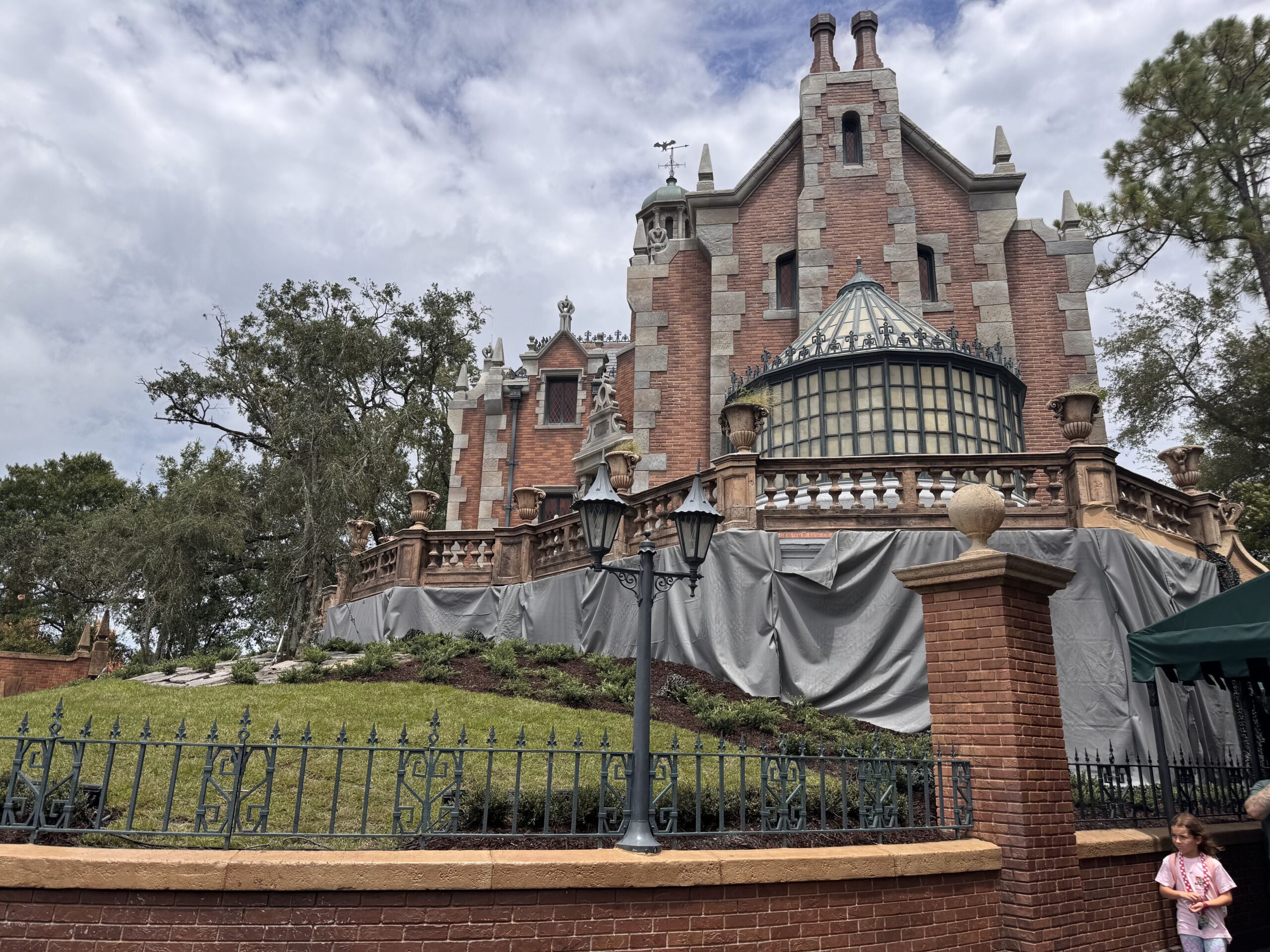 New Haunted Mansion Landscaping Installed as Facade Overhaul Nears Completion